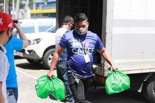 Uniqlo Philippines, SM Foundation distribute relief packs