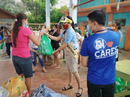 SM Foundation distributes Kalinga packs to fire victims in Palawan