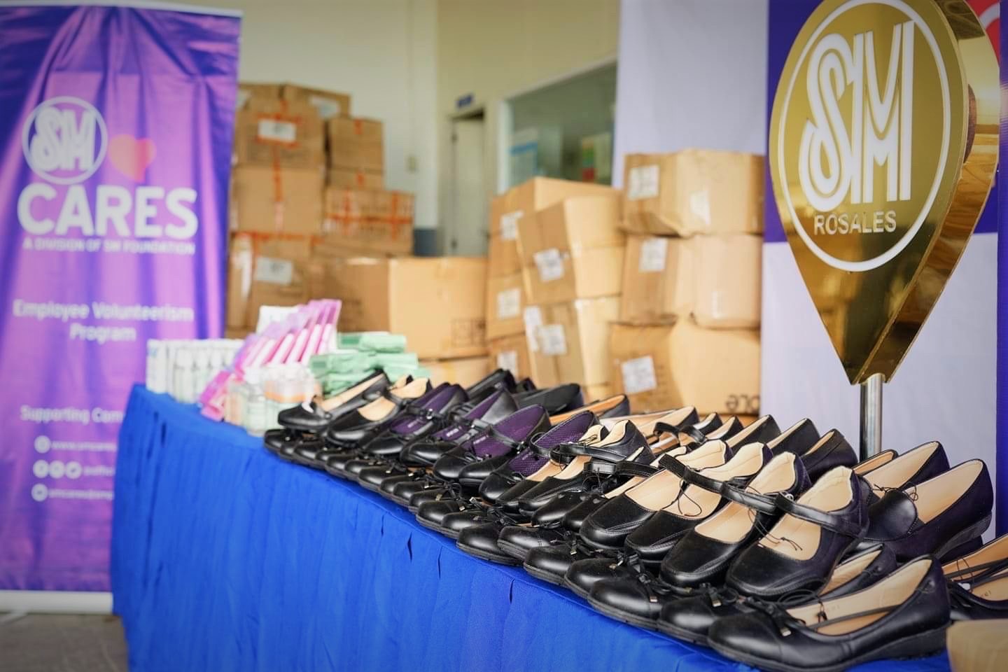 SM Foundation, The SM Store provide shoes, sanitizers to children nationwide