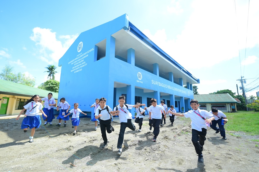 SM Prime and SM Foundation turns over a two-story, four-classroom school building to Suaybaguio–Riña Elementary School in Magugpo North, Tagum City on Oct. 16, 2025.