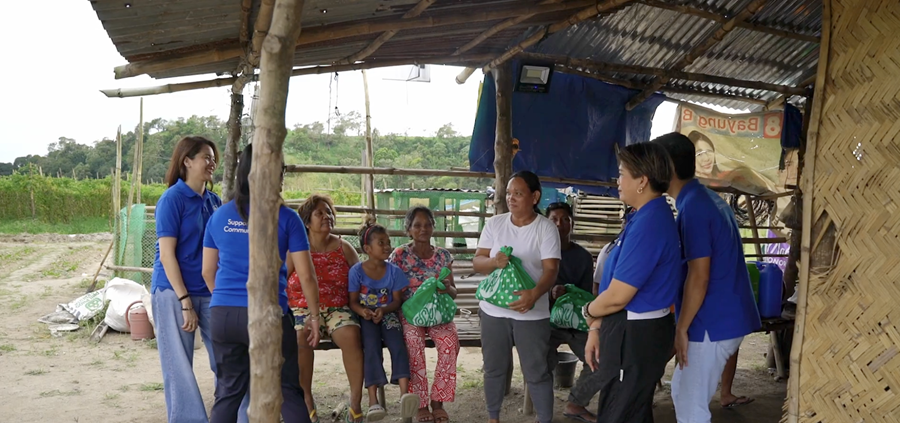 Andrea Rodriguez (first from left) visits a community frequently affected by typhoons as part of the mall's dedicated effort to reach out and provide disaster relief to the communities it serves. Photo courtesy of Business Matters/TV8 Media
